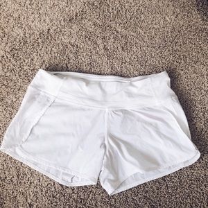 White lululemon running shorts